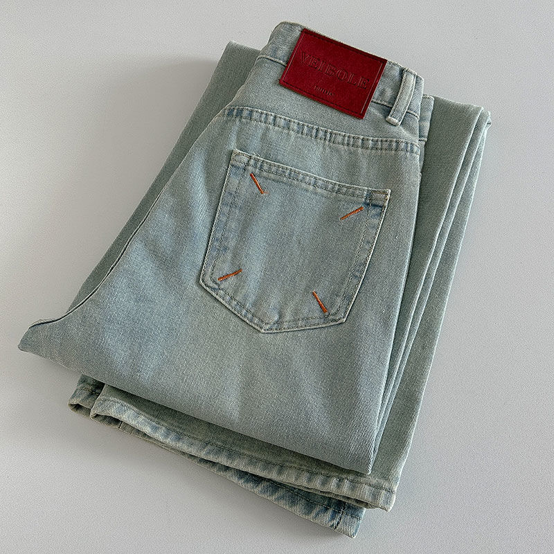 Női padlóig érő denim farmer, körte alakú testtípus, magas derék, kontrasztos hímzés, laza, széles szárú, egyenes szabás