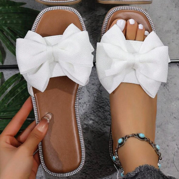 Női slip-on papucs masnival, textil felsőrész, négyzetes orr, lapos talp