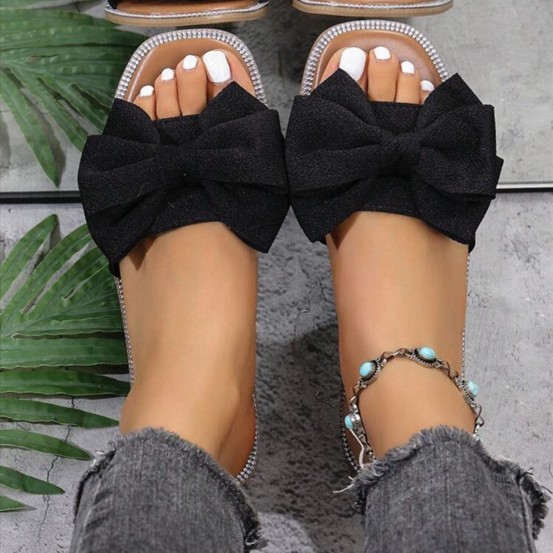 Női slip-on papucs masnival, textil felsőrész, négyzetes orr, lapos talp