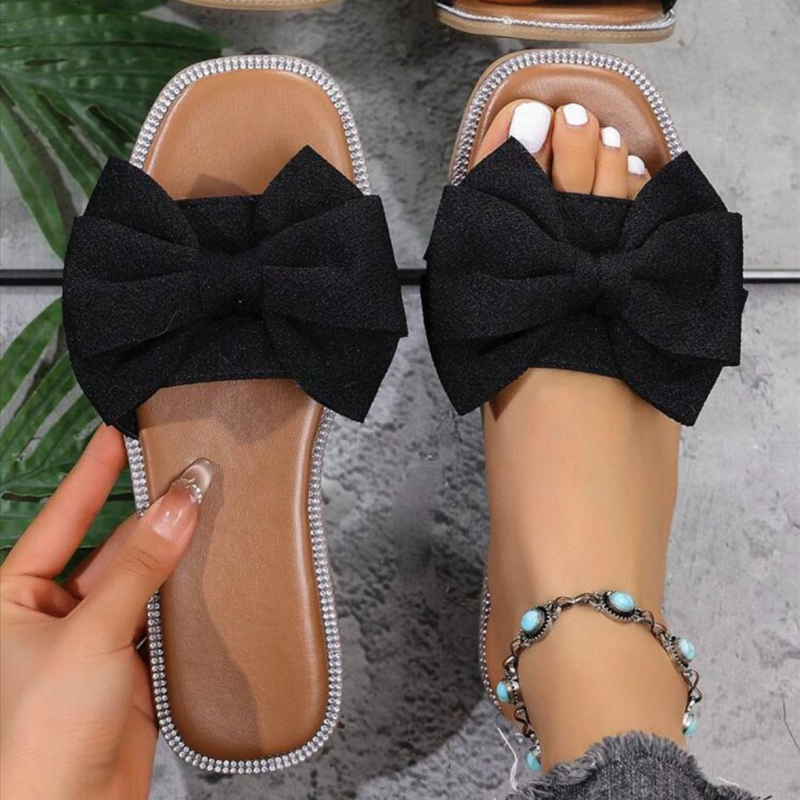 Női slip-on papucs masnival, textil felsőrész, négyzetes orr, lapos talp