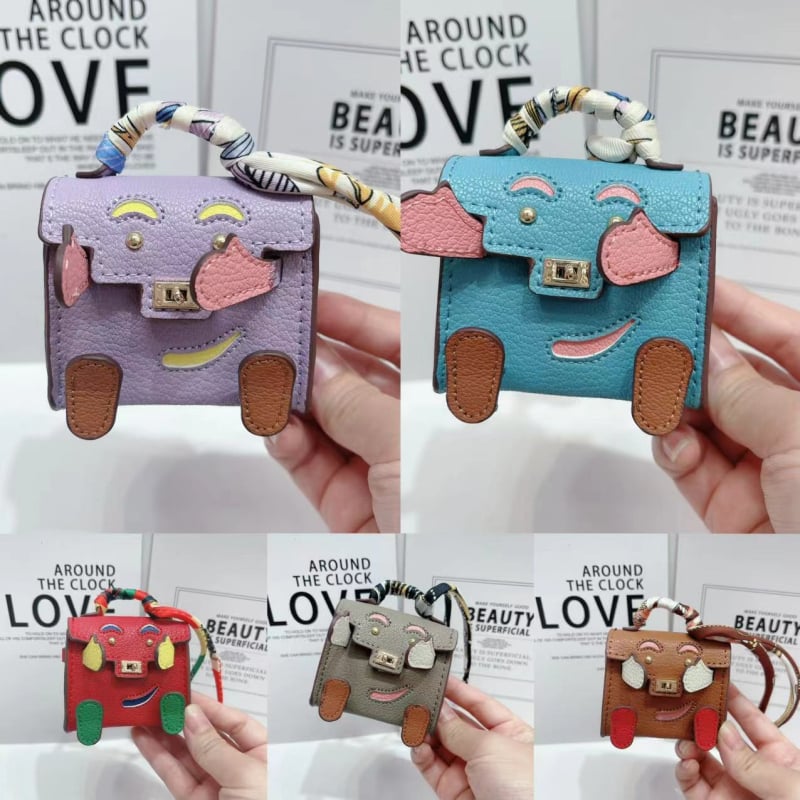 Kelly Doll táska – egyedi tok vezeték nélküli Bluetooth fülhallgatókhoz, mini luxus függő, női crossbody táska