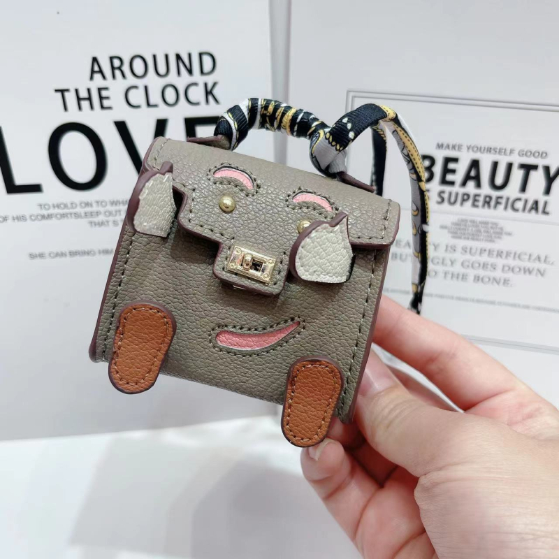 Kelly Doll táska – egyedi tok vezeték nélküli Bluetooth fülhallgatókhoz, mini luxus függő, női crossbody táska