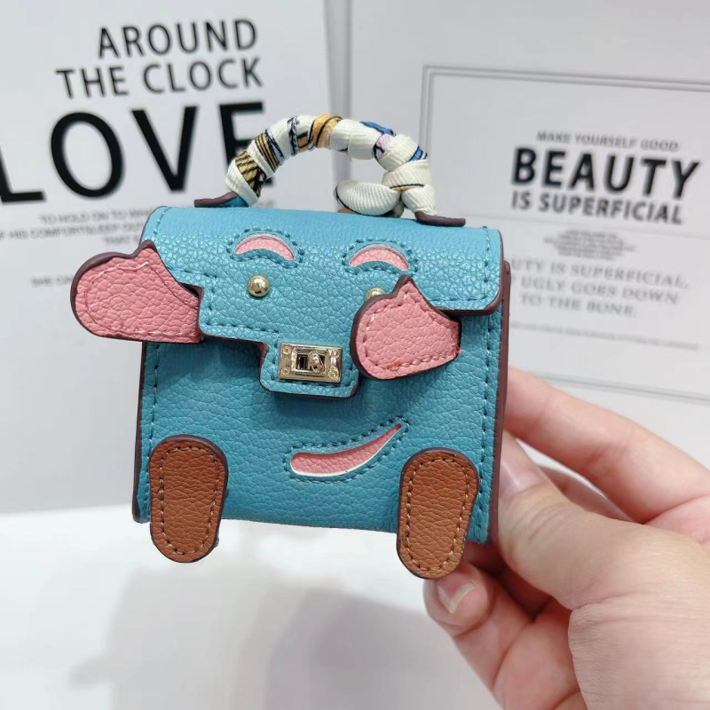 Kelly Doll táska – egyedi tok vezeték nélküli Bluetooth fülhallgatókhoz, mini luxus függő, női crossbody táska