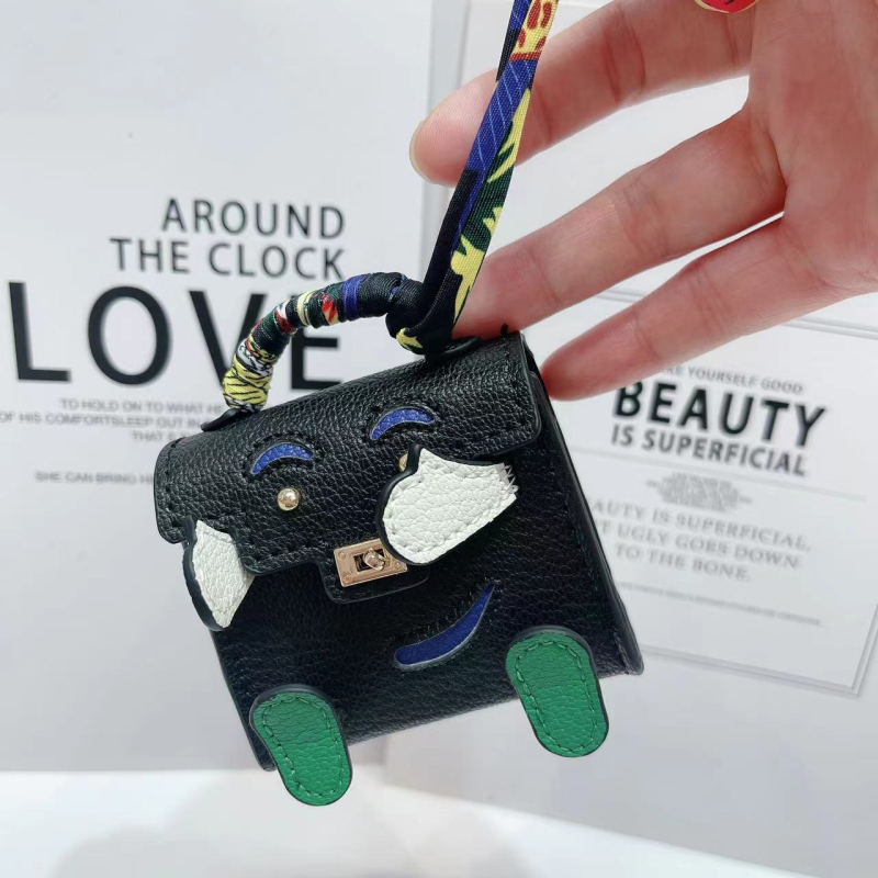 Kelly Doll táska – egyedi tok vezeték nélküli Bluetooth fülhallgatókhoz, mini luxus függő, női crossbody táska