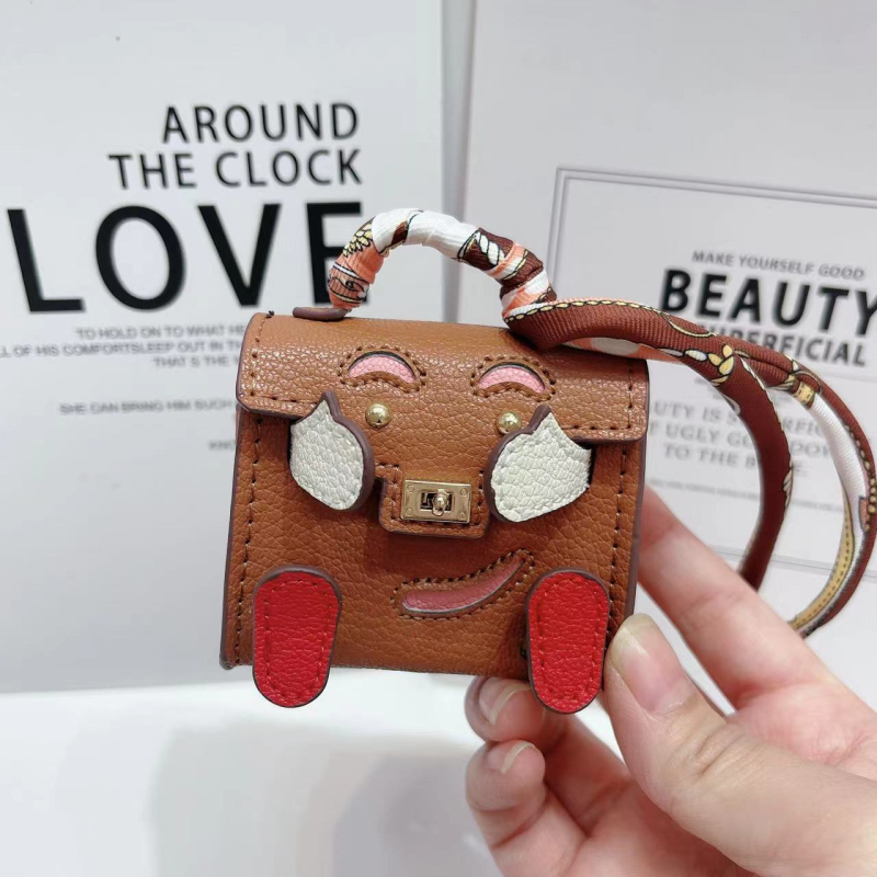 Kelly Doll táska – egyedi tok vezeték nélküli Bluetooth fülhallgatókhoz, mini luxus függő, női crossbody táska