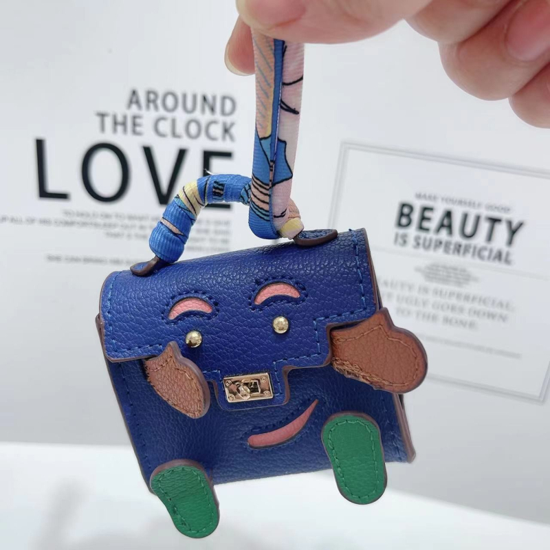 Kelly Doll táska – egyedi tok vezeték nélküli Bluetooth fülhallgatókhoz, mini luxus függő, női crossbody táska