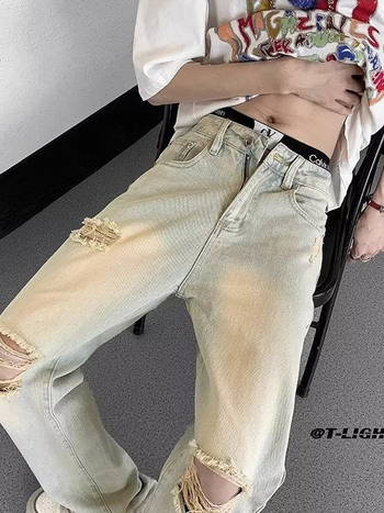 Férfi szakadt, mosott denim farmernadrág, egyenes szabás, széles sziluett, mindennapi viselet