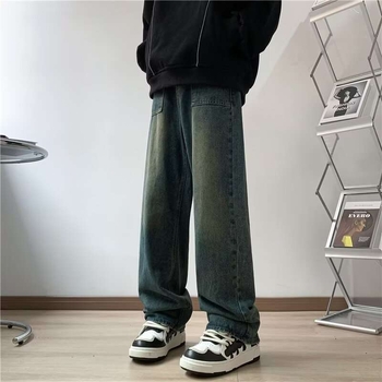 Férfi denim farmernadrág, laza egyenes szabás, széles lábak, padlót érő hosszúságú, streetwear-stílus ősze 2026