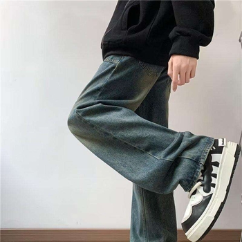 Férfi denim farmernadrág, laza egyenes szabás, széles lábak, padlót érő hosszúságú, streetwear-stílus ősze 2026