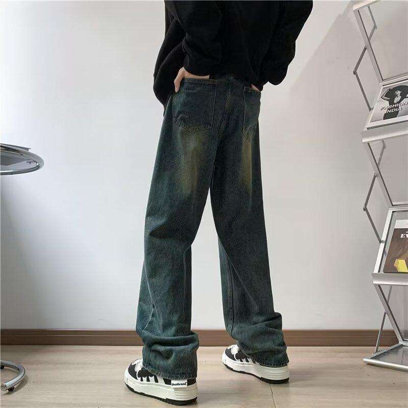 Férfi denim farmernadrág, laza egyenes szabás, széles lábak, padlót érő hosszúságú, streetwear-stílus ősze 2026