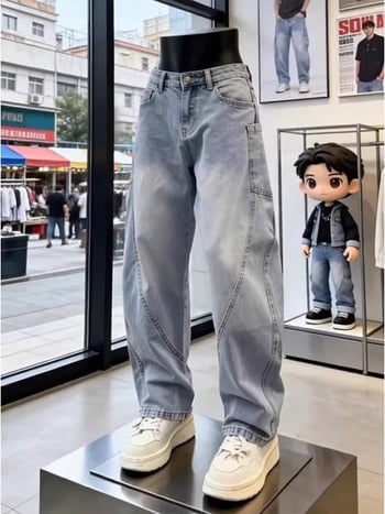 Blugi denim albastru spălat pentru bărbați, croială slim, tiv curbat, stil primăvară casual.