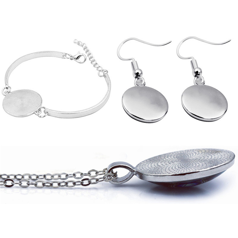 Set de bijuterii cu fluture și floare, simbolul păcii pentru femei – colier, cercei și brățară