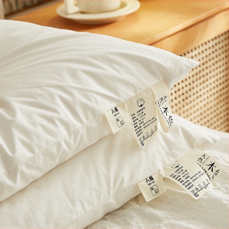 Възглавница правоъгълна с пълнеж от Xinjiang памук, сваляща се и изпираема, за един човек.