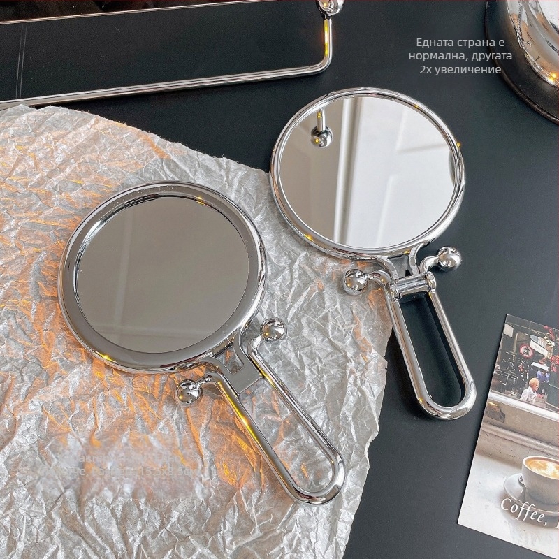 Козметично огледало, двустранно, сгъваемо, преносимо — за ръчно и настолно използване; ABS рамка, сребърно огледало.