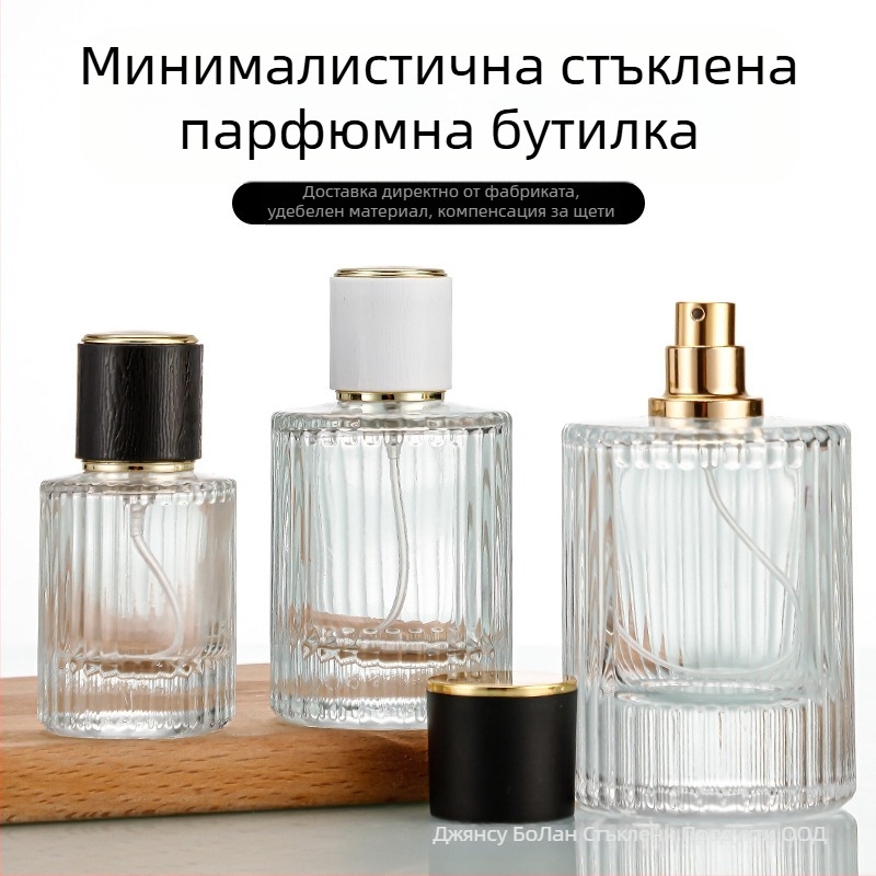 Стъклена бутилка за парфюм със винтово гърло, кръгло прозрачно тяло, дебело вертикално ивично стъкло, голям страничен спрей, тежък капак