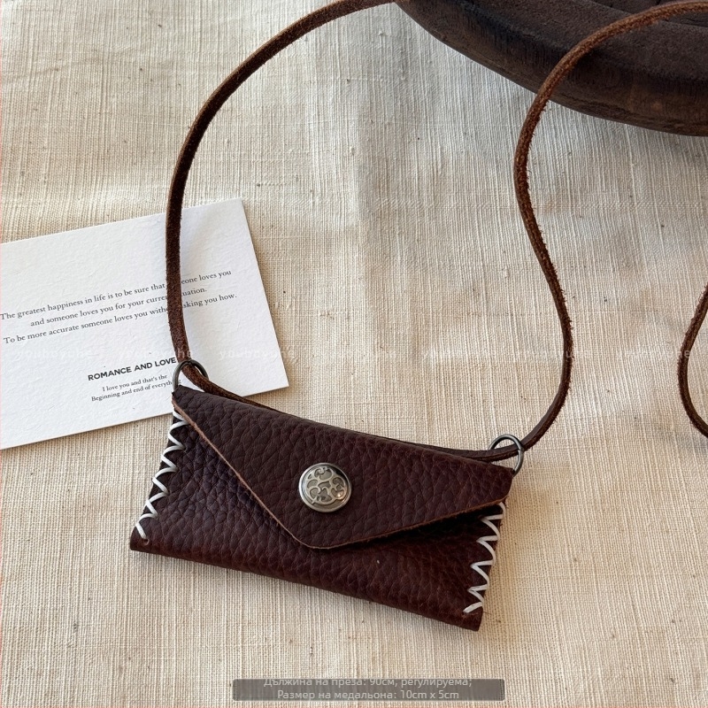 Огърлица с кожена връв от кравешка кожа и медна висулка, Инст стил, есен 2025