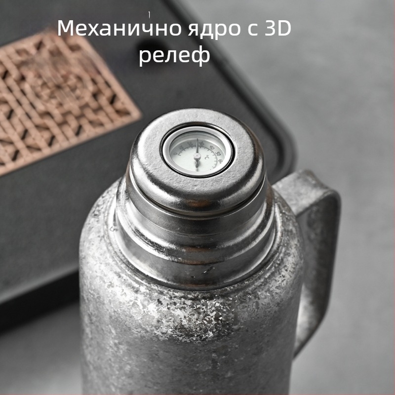 Титаниев вакуумноизолиран термос със механичен термометър, чайно отделение и капак с изскачащ механизъм.