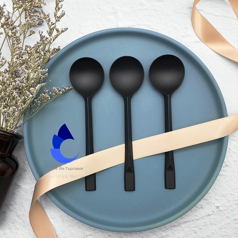 Еднократна пластмасова десертна лъжичка с дълга дръжка и дебела голяма кръгла глава, индивидуално опакована.