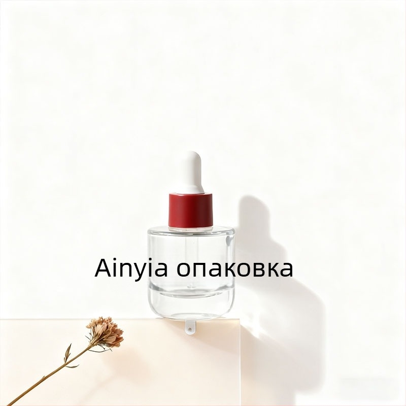 Ръчно издухана стъклена бутилка за капкомер за етерично масло с цилиндрично плоско рамо; повърхностни обработки: спрей покритие, горещо щамповане, електроплакиране; персонализирани опции.