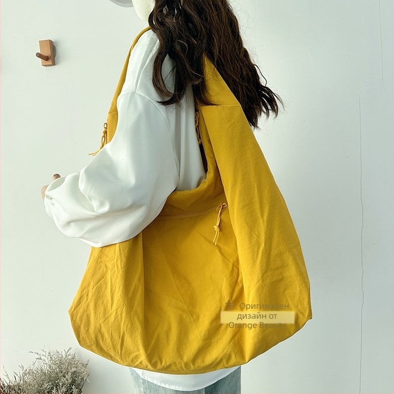 Найлонова Tote чанта за свободно време — мека конструкция, полиестерна подплата, вътрешен джоб с цип, една презрамка, корейски стил