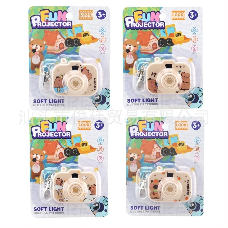 Капибара проекционна камера ключодържател за деца – светеща играчка с проекция (материал: пластмаса; функция: проекция; възраст: 4–6 г.; опаковка: блистер; произход: Шанту)