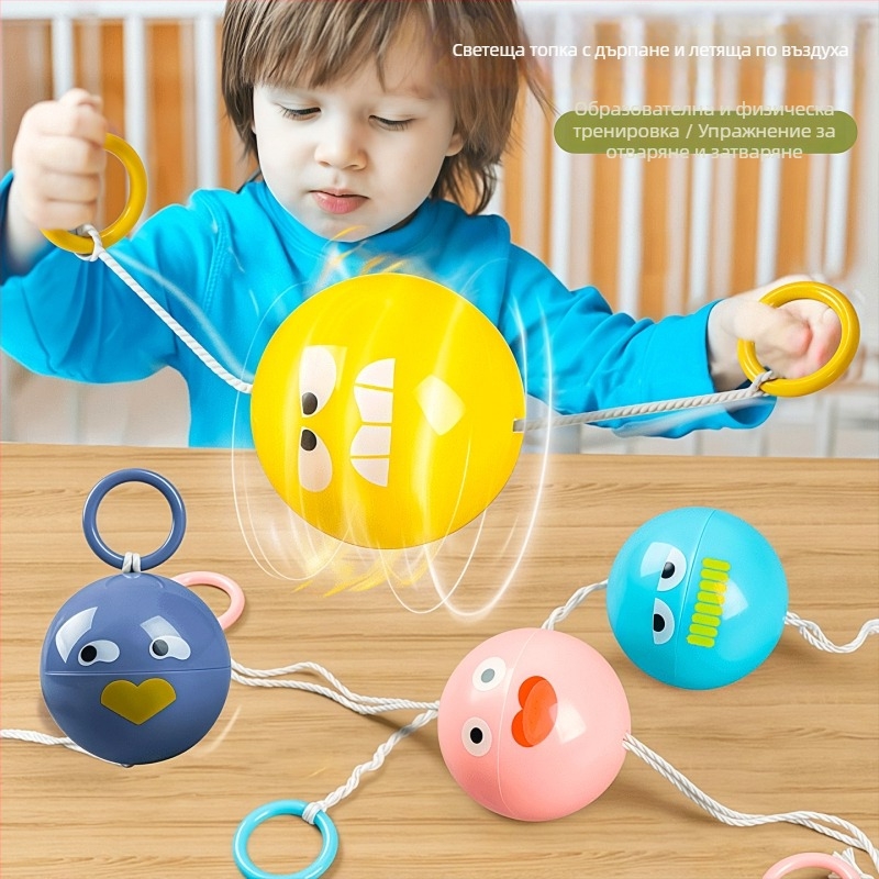 Образователна светеща играчка с въже за дърпане: въртящ се маховик, пластмасова конструкция, развива координация ръце-очи, зрение и интелект, насърчава родителско-детска комуникация