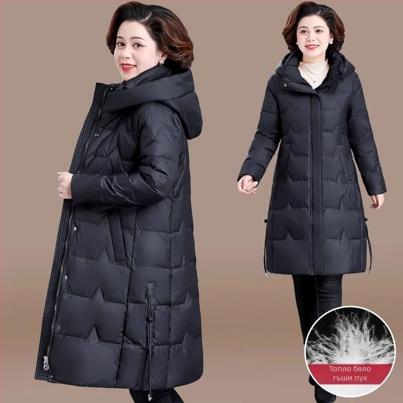 Дамско зимно пухено яке, бял патица пълнеж; пухово съдържание 51–55%/81–85%; средна плътност; полиестерна материя със спандекс; А-образна кройка; стояща яка; ултра къса дължина ≤40 cm