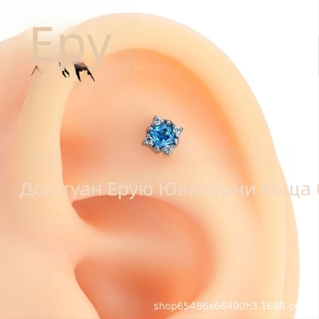 Обeци от титанов сплав със звездообразна форма и цирконови кристали, полирана повърхност, чистота F136