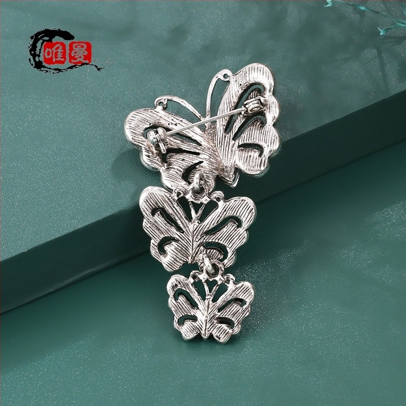 Брошка: пеперуден дизайн и насеком стил с кристално диамантено покритие (Материал: сплав; Стил: насекомо; Обработка: Диамант; Функция: многофункционална; Вид: брошка)