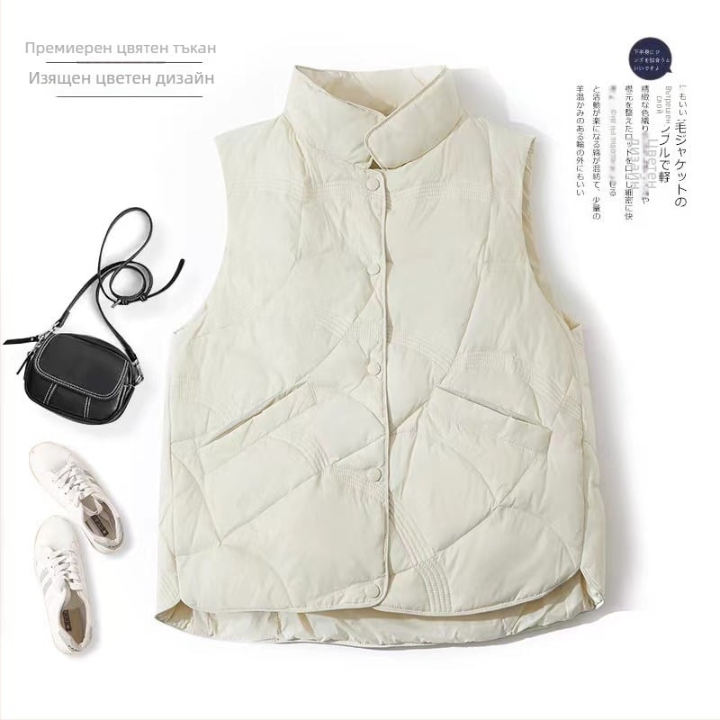 Пухена жилетка, свободен силует, полиестерна основна материя, пух от бяла патица, 66–70% пух