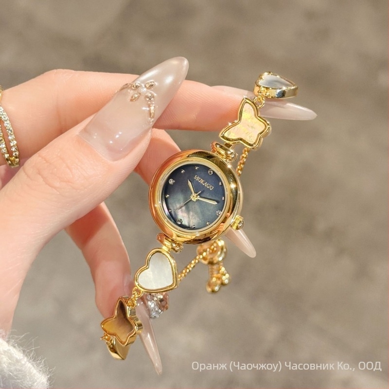 Mokago женски кварцов часовник 8163, перлен циферблат, корпус от сплав, водоустойчив до 30 м, спирална корона