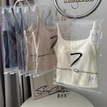 Памучен потник, съдържа 80-90% памук, V-образно деколте, тегло на тъканта 181–200 г/м2, стил жилетка