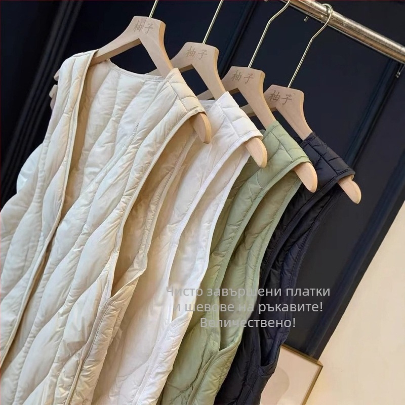 Дамска пухена жилетка с патешки пух 81–85%, полиестерна тъкан, V-образна яка, еднобортно закопчаване