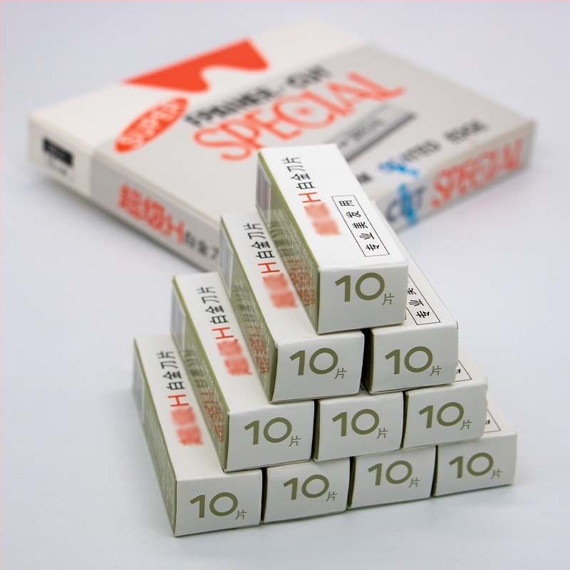 100 броя неръждаеми ножчета за вежди със едностранно вълнообразно острие за гримьори