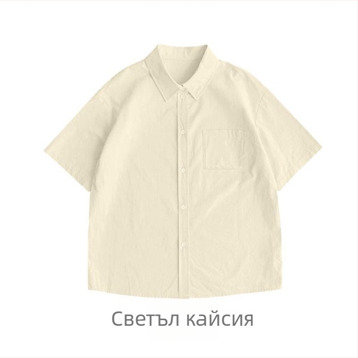 Памучна риза, свободна кройка, къс ръкав, яка с ревър, еднопосочно копчане