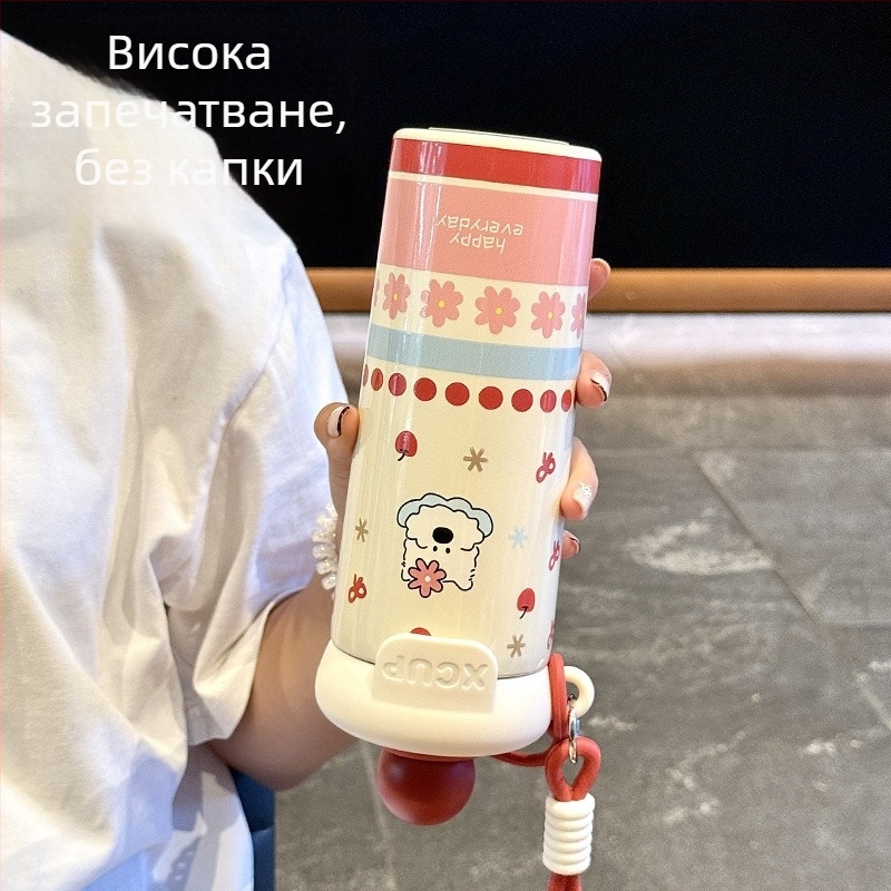 Изолирана чаша с вътрешен съд от 316 неръждаема стомана, външен корпус от 201 неръждаема стомана, вакуумна изолация 6–12 ч, презрамка за носене и капачка със сламка, персонализиране чрез лазерно гравиране или ситопечат.