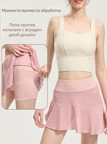 Пола с вградени шорти, висока талия за стягане на корема, бързосъхнеща и непрозрачна; полиестер/спандекс 97%/3%; подплата: найлон/спандекс 80%/20%.