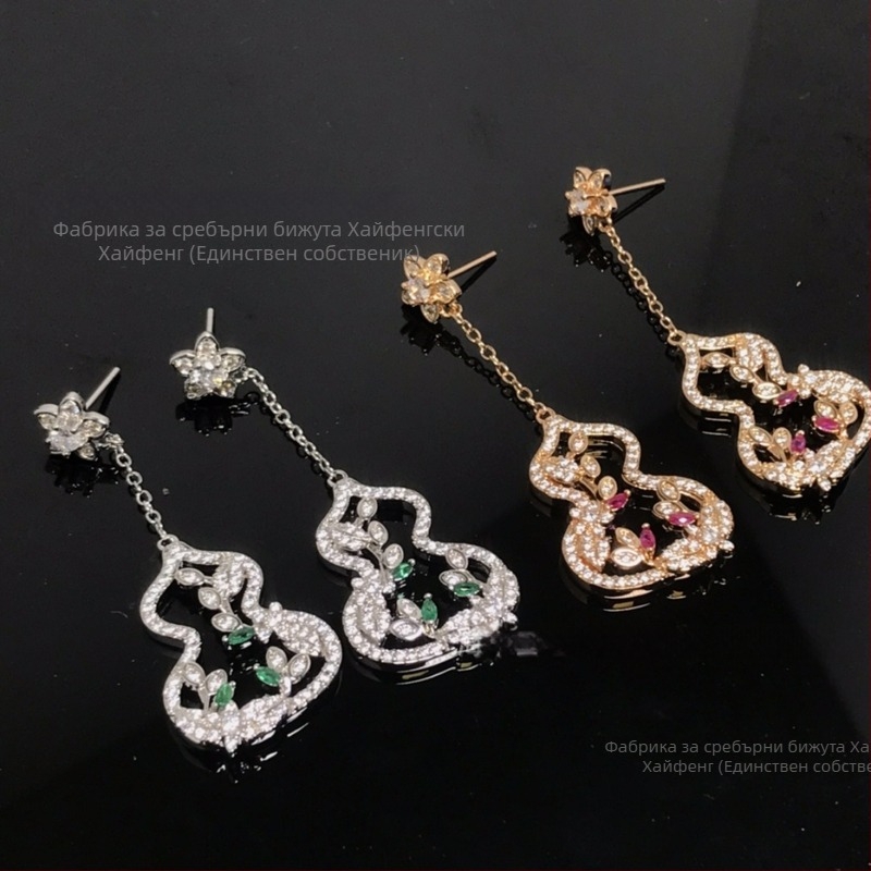 Обеци Jubilee Jewelry — златно покрити, капковидна геометрия, пролет 2025