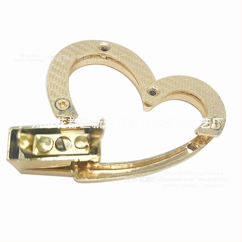 Сърцевидно завъртащо заключване за чанти - модел 659, цинкова сплав, марка New Beauty