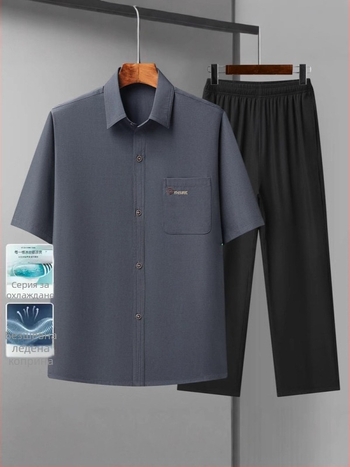 Риза с тесен силует, къс ръкав, яка тип лафел, полиестерна тъкан, едноцветен модел