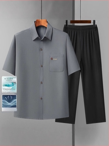 Риза с тесен силует, къс ръкав, яка тип лафел, полиестерна тъкан, едноцветен модел