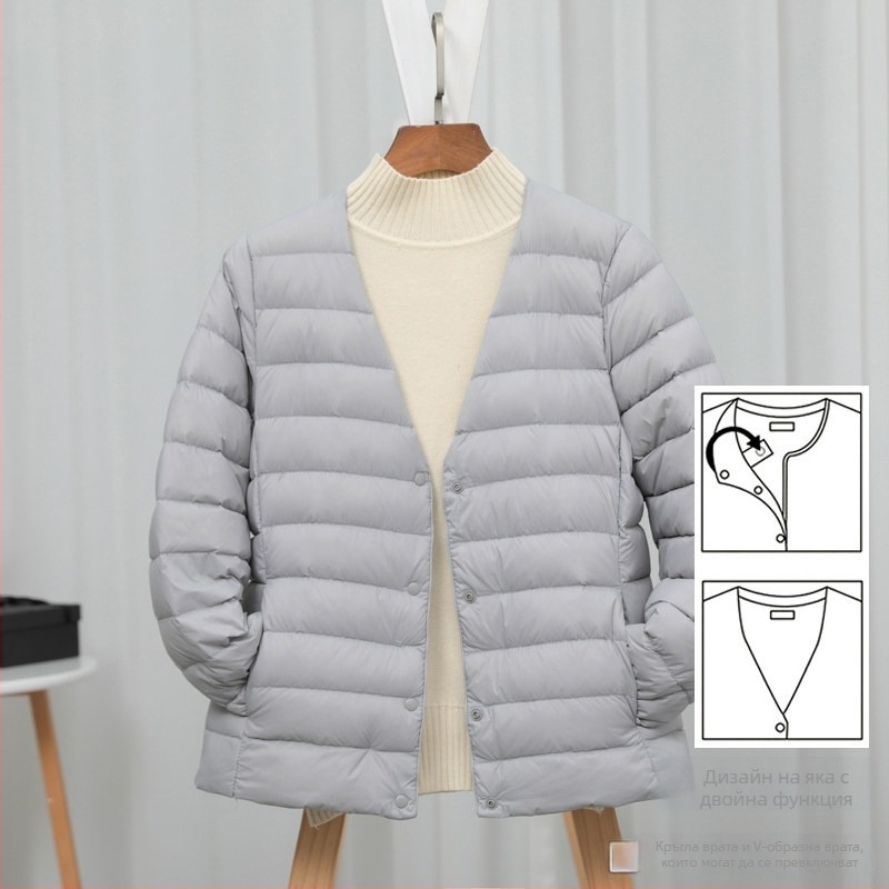 Дамско пухено яке, slim-fit модел; пълнеж: пух от бяла патица; материя: найлон; съдържание на пух: 50%; яка: wood-ear edge collar