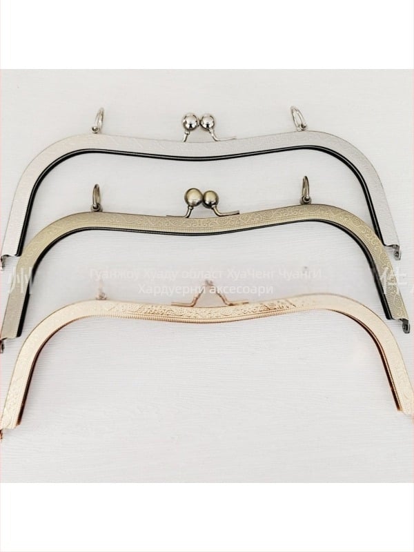 Хардуер за чанти със винтово дупче — 27 вдлъбнати талии и изпъкнала кръгла глава, дизайн bucket-ear. Материал: желязо. Код на продукта: 000306. Haowen luggage accessories factory. Есен 2024. Категория: чанти аксесоари.