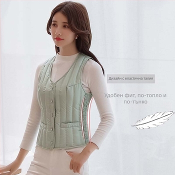 Дамска пухена жилетка, къса, Slim-fit, лека; пълнеж: пух от бяла утка; основен плат: полиестер 100%; подплата: полиестер; дължина 40–50 см; без яка; без ръкави