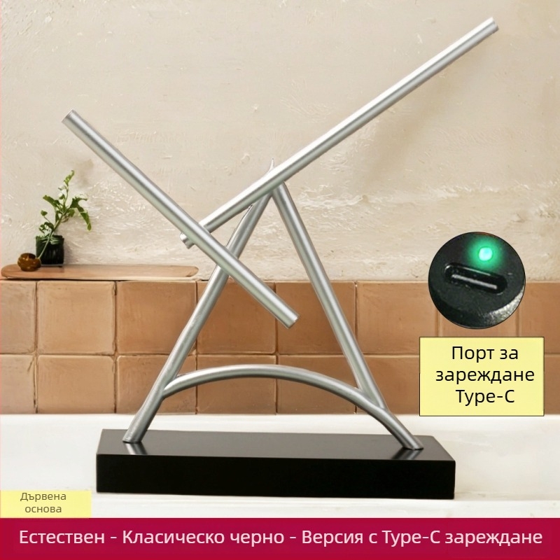 Маятник на Нютон: Железният човек Chaos – настолен декоративен елемент с постоянно движение