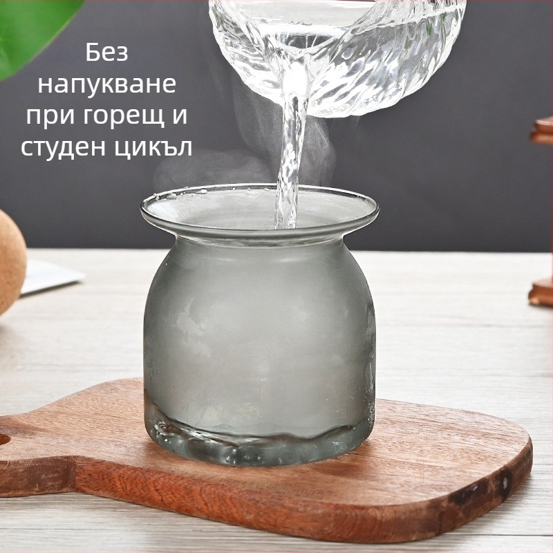 Стилен термоустойчив стъклен буркан за съхранение с цветно стъкло и кръгла коркова тапа — подходящ за зърна, чай и кафе.