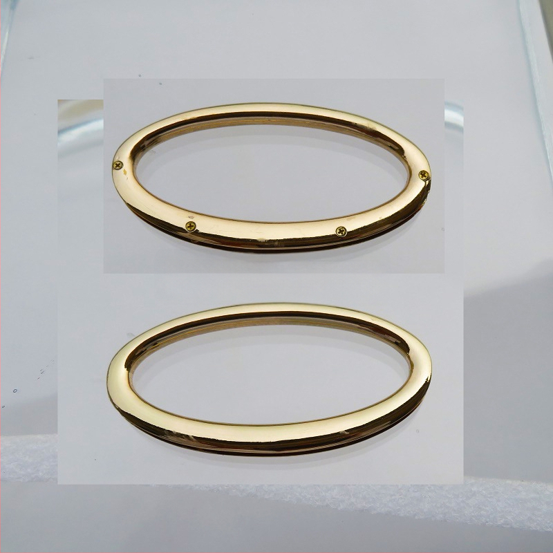 Metalo rankenos laikiklis – kiaušinio formos ovalas, tiesus strypas, didelis lankas