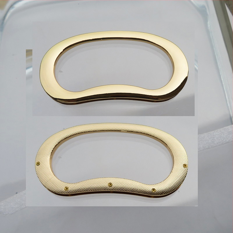 Metalo rankenos laikiklis – kiaušinio formos ovalas, tiesus strypas, didelis lankas