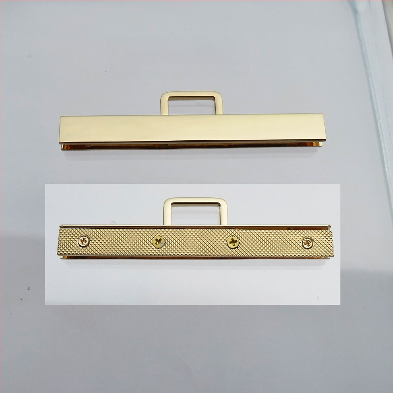 Metalo rankenos laikiklis – kiaušinio formos ovalas, tiesus strypas, didelis lankas