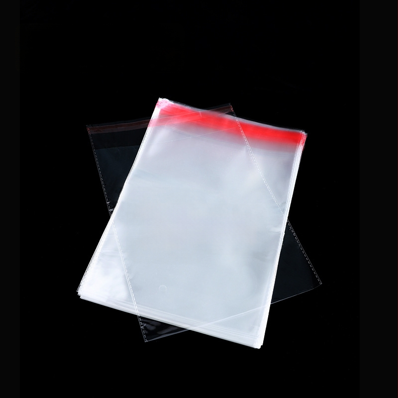 OPP savarankiškai užsegamas pakuotės maišelis, skaidrus, su logotipu, iš plastiko; drabužių ir juvelyrikos pakavimui; 100% grynos žaliavos; tolerancija ±0,2 cm